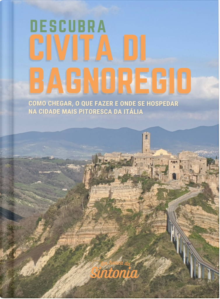 Foto de Civita di Bagnoregio vista de longe e representada como se fosse a capa de um livro com o escrito "Descubra Civita di Bagnoregio" e em baixo a logo do Em Busca da Sintonia
